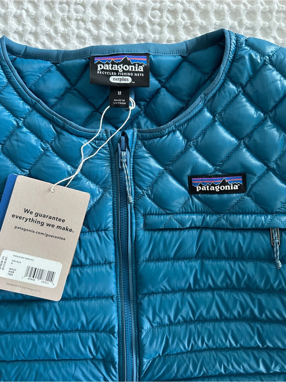 Patagonia NWT Wavy Blue Alplight Lightweight pullover jacket - Down filling.
